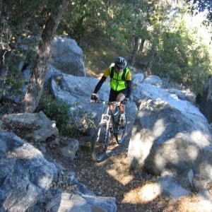 Richard weaving through rocks on Strawberry Peak Loop